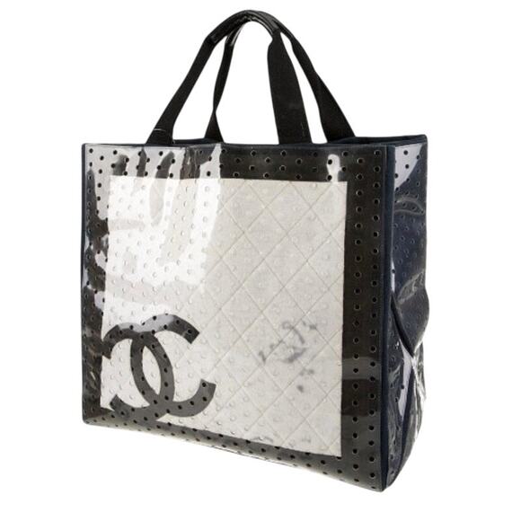 CHANEL Handbags - Chanel ENORMOUS tote, black + white fabric w/perforated pvc layer over material